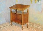 A029 Vintage Booktable. An antique reproduction with solid brass casters and side handles