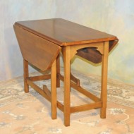 #707  Vintage Dropleaf chairside table.  Solid cherry, new condtion with gateleg design