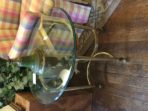 #309 Beveled glass and brass oval table with half round stretches