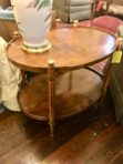 #874 Oval two-tiered table with 4-way book matched top