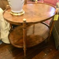 #874 Oval two-tiered table with 4-way book matched top